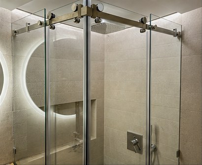 Glass shower enclosure